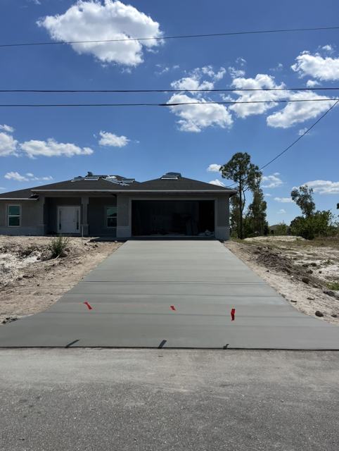 New driveway, fresh broom finish by Crete Concepts in Southwest Florida