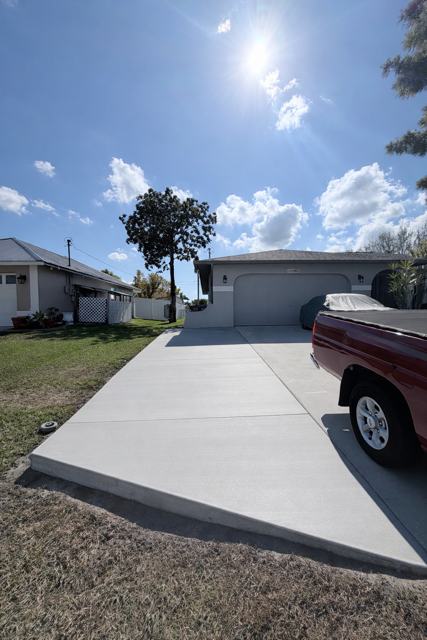 Driveway with clean control joints by Crete Concepts in Southwest Florida