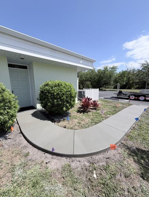 Curved entry walkway by Crete Concepts in Southwest Florida