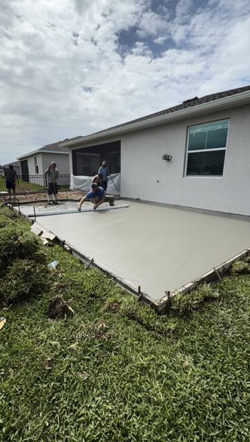 Placing and finishing a patio by Crete Concepts in Southwest Florida