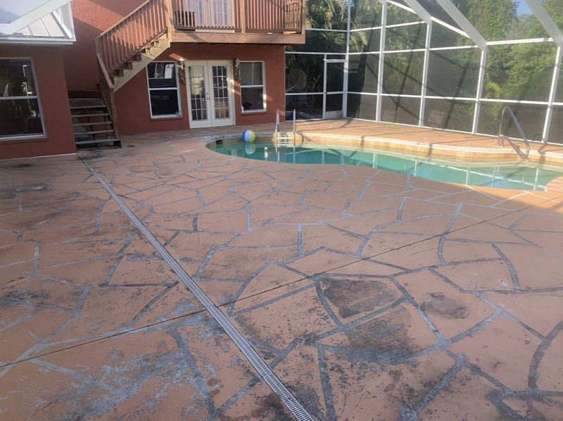 Decorative pool deck with a flagstone pattern, Crete Concepts, Southwest Florida