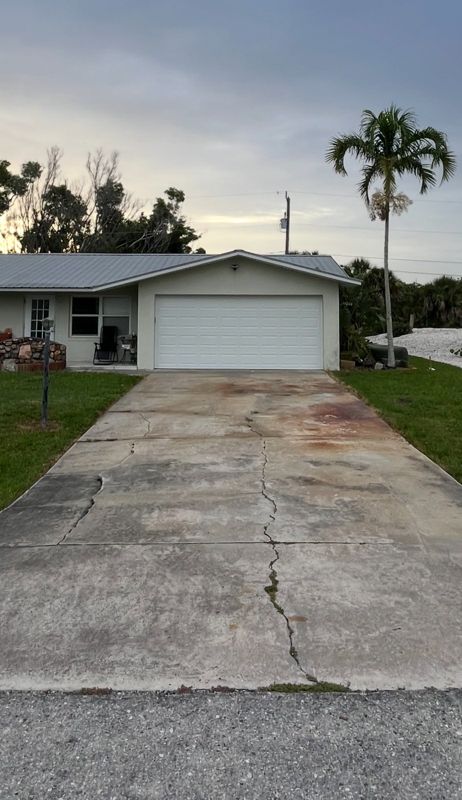 Before: cracked, worn-out driveway, Crete Concepts, Southwest Florida