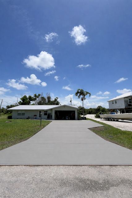 New driveway with a broom finish by Crete Concepts in Southwest Florida