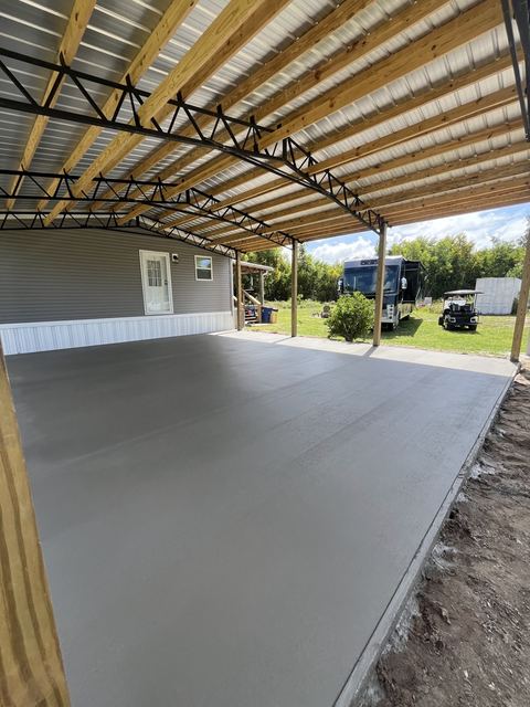 Large slab under a steel structure by Crete Concepts in Southwest Florida