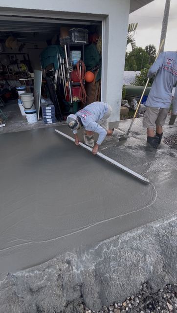 Screeding a new driveway by Crete Concepts in Southwest Florida